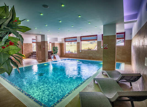 Rodinný goralský penzión Ždiaranka s chutnou polpenziou a výhľadom na Tatry z vírivky.