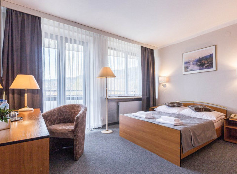 Poľské Tatry: Zakopané blízko aquaparku v Hoteli Helios s raňajkami, zľavovou kartou a saunou.